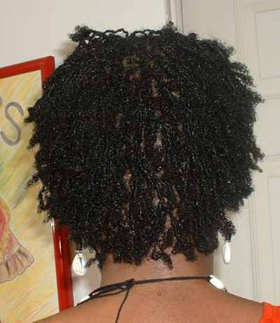The back of a short curled lock style